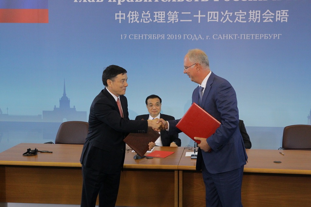 Signing ceremony with Ju Weimin,  President of China Investment Corporation